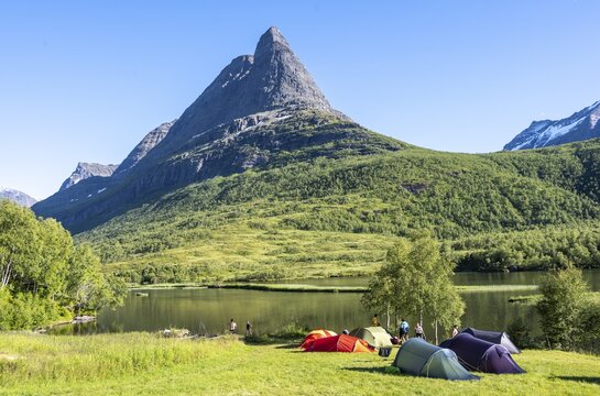 Tents on camping site by the lake Litlvatnet in the high valley Innerdalen, mountain Innerdalst&aring;rnet, Trollheimen Mountain Area, Sunndal, M&oslash;re og Romsdal, Vestlandet, Norway