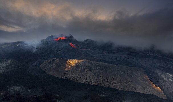 Aerial view, erupting volcano with lava fountains and lava field, crater with erupting lava and lava flow, Fagradalsfjall, Reykjanes Peninsula, Iceland