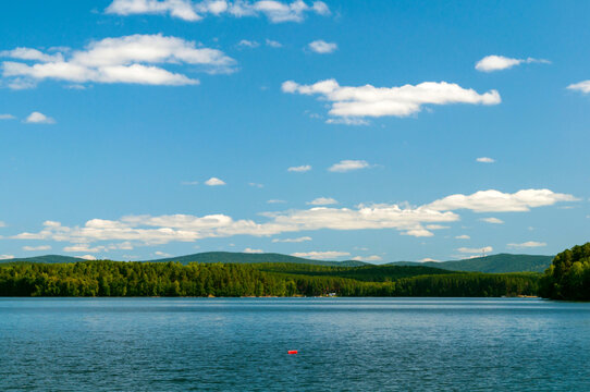 Summer travel landscape, summer landscape view of the Spruce Lake in Southern Urals in sunny day, concept of spending summer vacation at nature