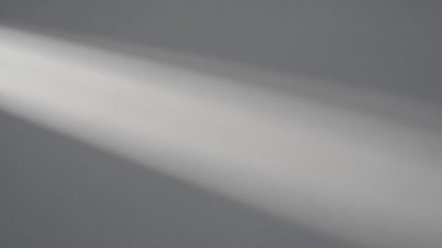Minimal abstract light shadow background, soft gray wall texture, cinematic moving beam for modern design overlays