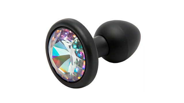 Black plastic butt plug with diamond on transparent background.