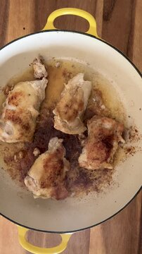Frying Chicken Thights in a Frying Pan