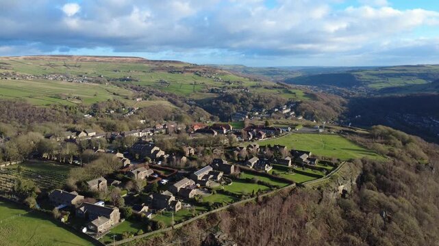 high aerial view of Colden valley showing the village of heptonstall and Hebden Bridge surrounded by West Yorkshire scenery