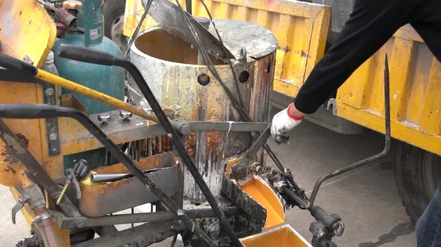 4K slow-motion real shot of road parking space line marking equipment