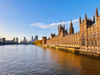 Fototapeta premium Palace of Westminster and River Thames at Golden Hour, London Skyline and Historic Houses of Parliament