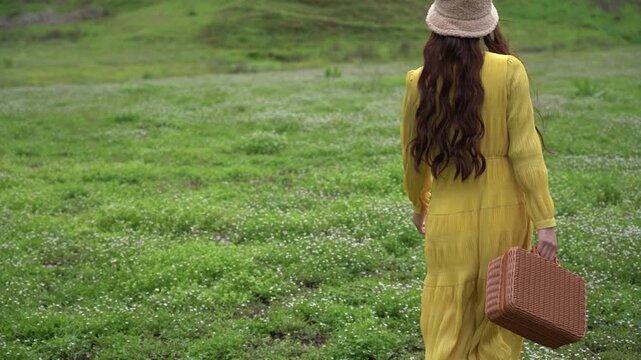 4K slow-motion video of a young girl's back during outdoor spring activities