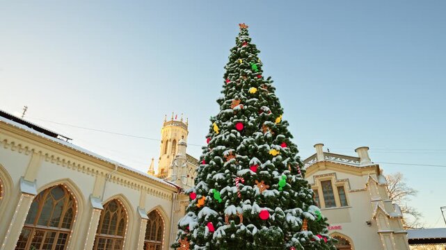 Russia, Peterhof, decorated Christmas tree near the Novy Peterhof railway station on a frosty winter day, New Year's decoration of the station