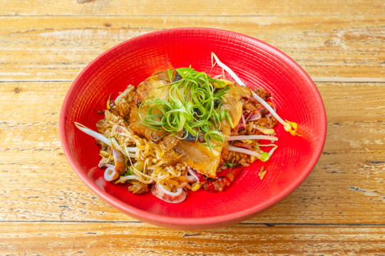 A delicious Filipino recipe for rice with fried pork and squid