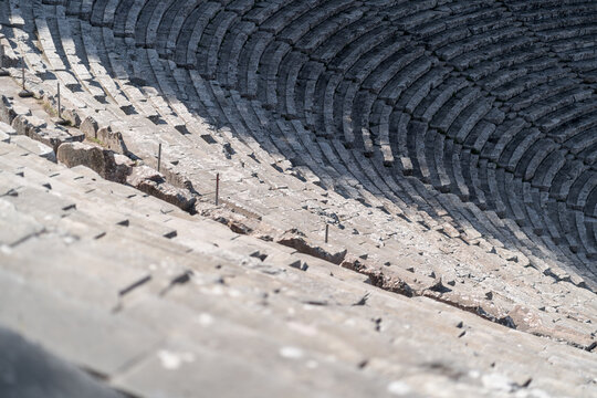 Ancient stone seating tiers of the Theatre of Epidaurus in greece