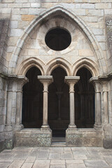 Fototapeta premium Gothic stone arches and cloisters of the Porto Cathedral