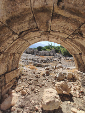Interior view of an ancient stone vaulted tunnel in Tlos ruins Turkey