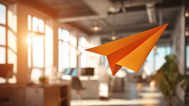 Creative business idea symbolized by orange paper plane in office, startup launch, communication, innovation, marketing strategy and professional growth concept. creative idea, ora