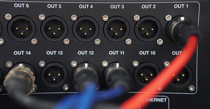 Close-Up of Audio Mixer Rear Panel with XLR Cable Connections