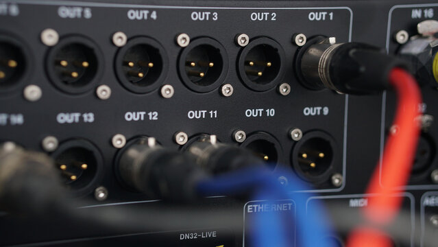 Close-Up of Audio Mixer Rear Panel with XLR Cable Connections