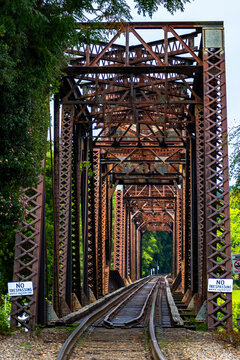 old rusted railroad trestle bridge