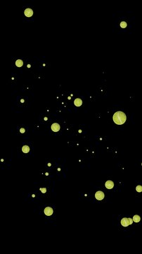 Tennis Ball Flying Toward Camera Loop on Black Background for vertical display