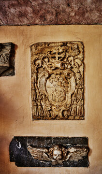 collection of historical architectural elements at Palazzo Baldeschi Cennini, built in the 14th century in Perugia, Italy, Europe 