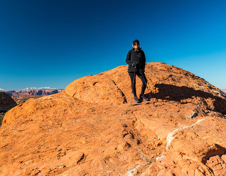 Female Hiker Above Upheaval Canyon From The Syncline Trail, Canyonlands National Park, Utah, USA