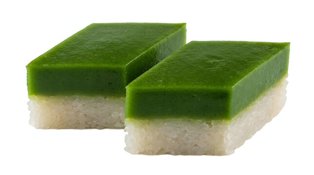 Traditional Malaysian Kuih Seri Muka two-layered pandan and glutinous rice cake, isolated on a pure white background