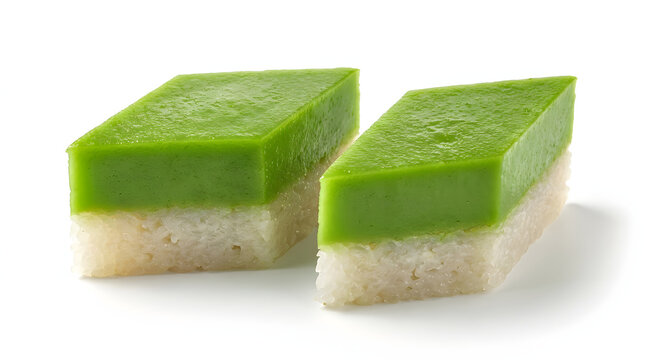 Traditional Malaysian Kuih Seri Muka two-layered pandan and glutinous rice cake, isolated on a pure white background