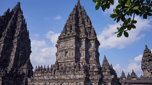 Prambanan temple complex in Indonesia under a blue sky