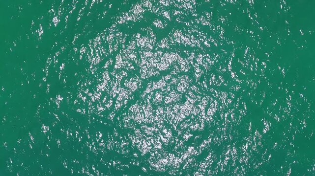 Aerial view drone top shot of over tropical sea. Royalty high-quality free best stock of beautiful wave calm, blue water surface background, top view texture. Turquoise sea backgrounds, paradise relax