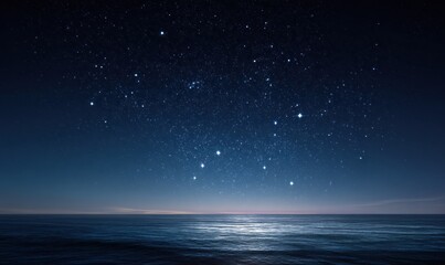 Fototapeta premium Night sky with stars reflecting on tranquil ocean surface