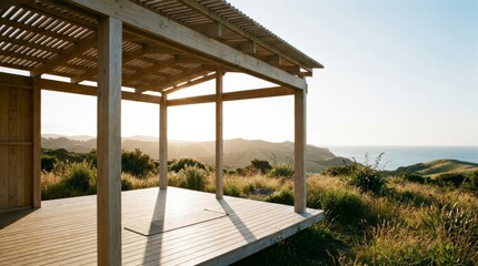 Fototapeta premium Open air pavilion overlooking coastal landscape at sunset with outdoor space