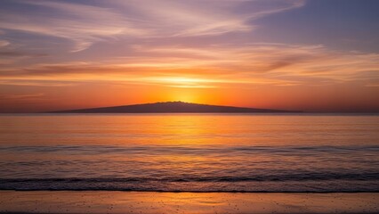 Obraz premium Vibrant ocean sunset with golden reflection and distant island silhouette