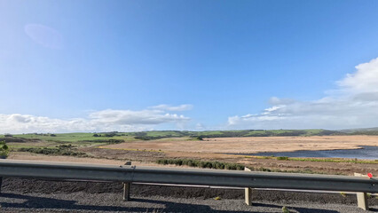 Fototapeta premium Scenic View of Coastal Wetlands and Hills from Great Ocean Road