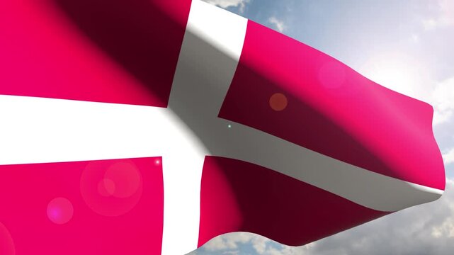 Denmark Flag Fluttering Gracefully Against the Open Sky