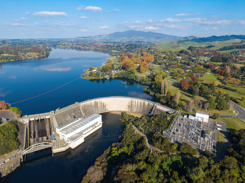 Aerial view of the Karapiro Hydroelectric Dam and power station on the Waikato River, New Zealand, in autumn