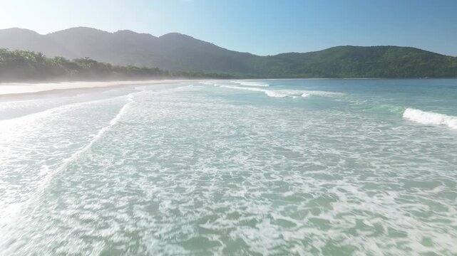 Low altitude flight over the beach of Lopes Mendes on the island of Ilha Grande in Brazil