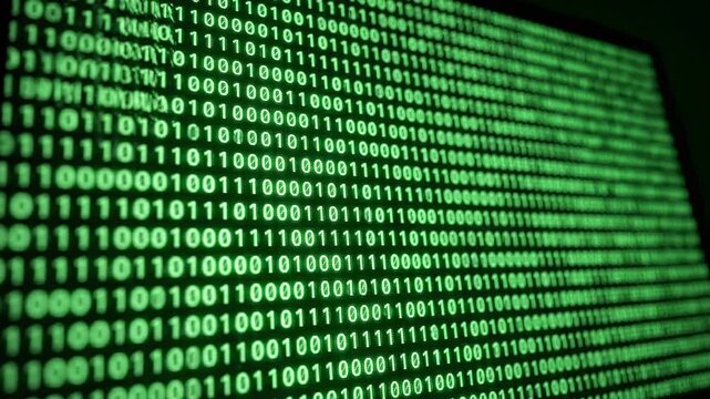 Green binary code on computer screen.