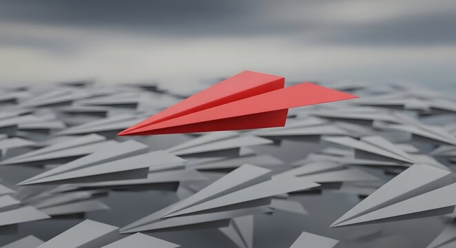 Vibrant red paper plane taking flight above a multitude of gray counterparts, symbolizing leadership, innovation, and the power of breaking away from the conventional path