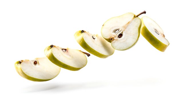 Sliced pear pieces floating in mid-air, isolated on a clean white background, fresh fruit.