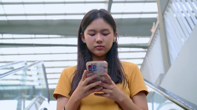 vibrant lifestyle photo of a modern young woman interacting with an artificial intelligence assistant on her smartphone.