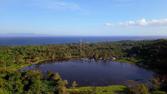 Aerial View of Danau Yeh Malet Lake and Tropical Coastline in Bali, Indonesia