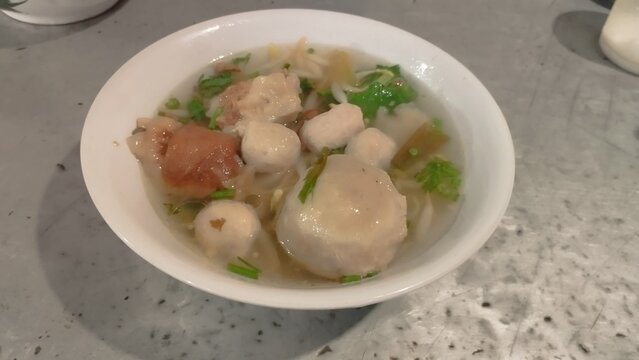 baso soup inside white bowl