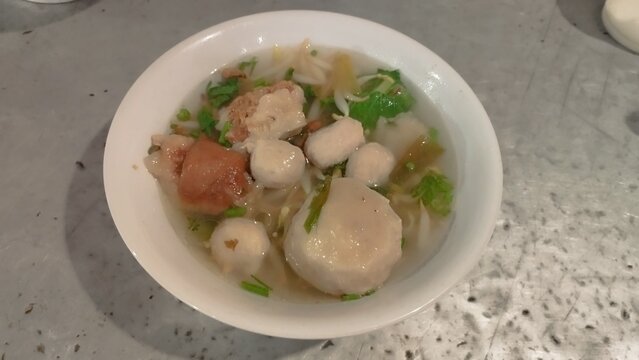 baso soup inside white bowl