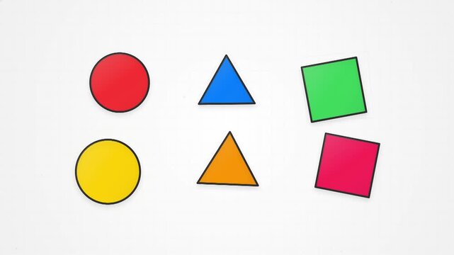 Six colorful geometric shapes including circles triangles and squares are displayed on a clean white grid background.