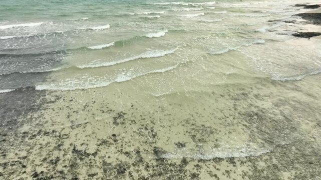 Tropical Nature sand sea and summer sea water with beautiful bright sunlight. Perfect for summer vacation and travel background	