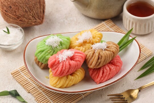 getuk singkong made from steamed cassava, served as a colorful sweet snack with grated coconut