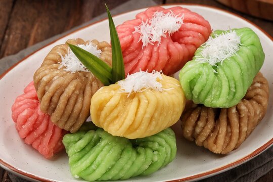 getuk singkong made from steamed cassava, served as a colorful sweet snack with grated coconut