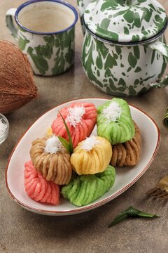 getuk singkong made from steamed cassava, served as a colorful sweet snack with grated coconut