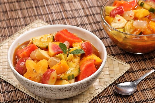 Rujak kweni or rujak aceh is a type of typical Acehnese rujak made from mashed kweni mango with chili, sugar, salt and tamarind juice.
