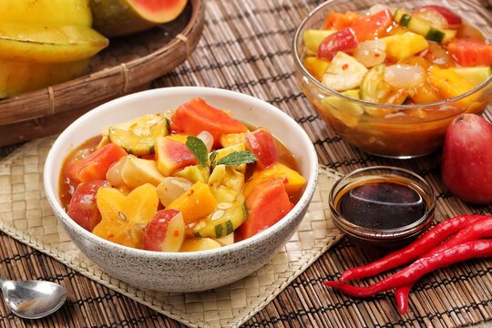 Rujak kweni or rujak aceh is a type of typical Acehnese rujak made from mashed kweni mango with chili, sugar, salt and tamarind juice.
