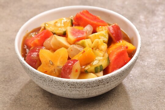Rujak kweni or rujak aceh is a type of typical Acehnese rujak made from mashed kweni mango with chili, sugar, salt and tamarind juice.
