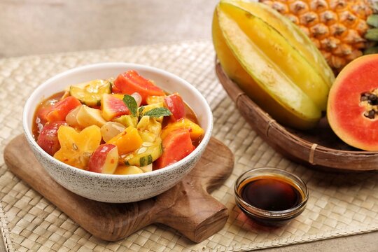 Rujak kweni or rujak aceh is a type of typical Acehnese rujak made from mashed kweni mango with chili, sugar, salt and tamarind juice.
