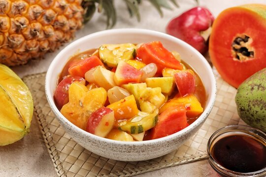 Rujak kweni or rujak aceh is a type of typical Acehnese rujak made from mashed kweni mango with chili, sugar, salt and tamarind juice.
